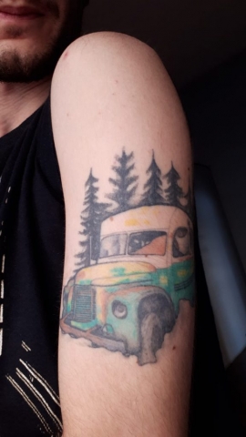 Thomás De Freitas Basile's Tattoo of Bus 142