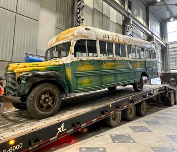 Bus 142 Loaded on the Flatbed